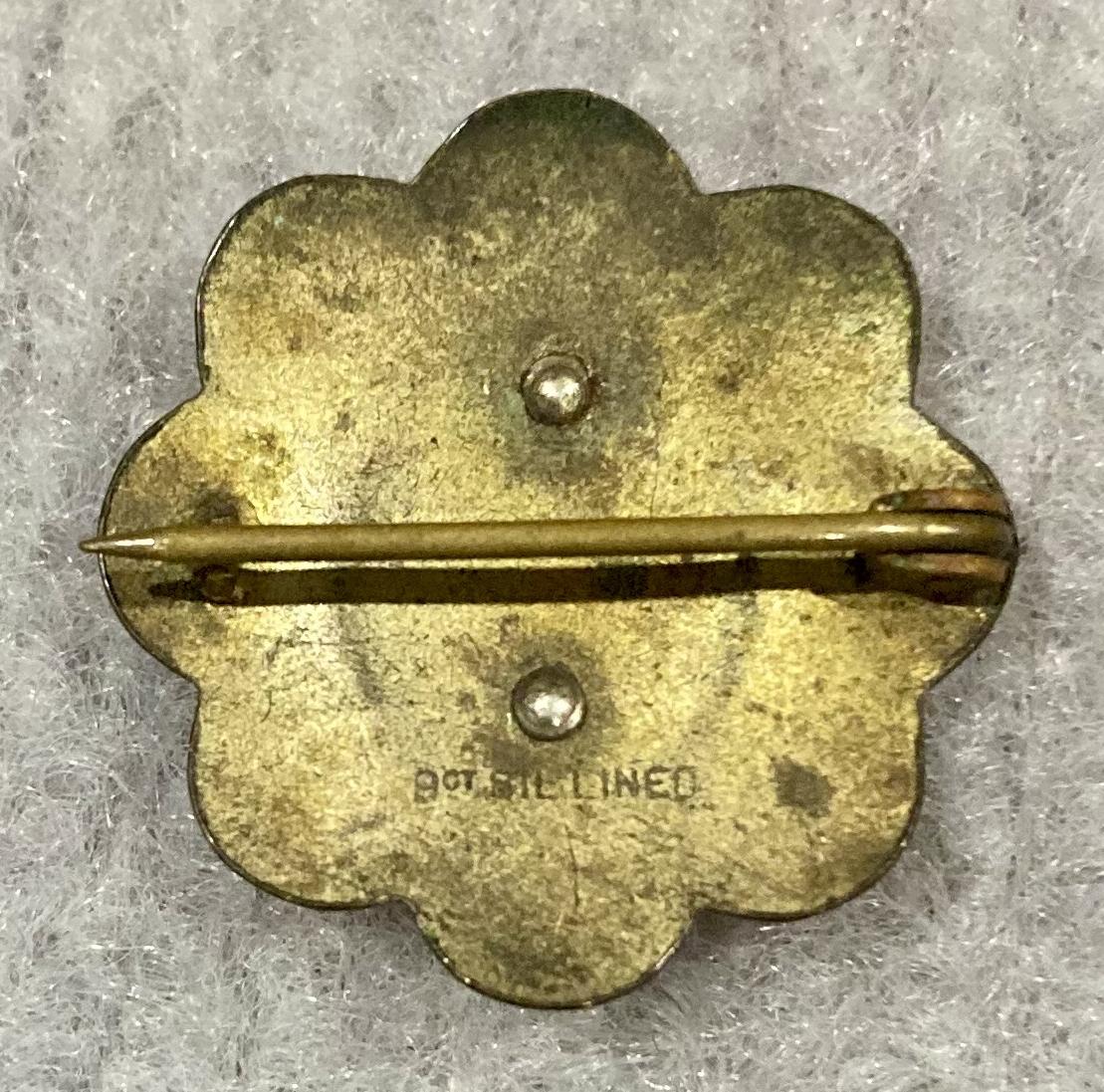 Reverse of Royal Australian Air Force 9 carat gold, silver lined circular sweetheart brooch