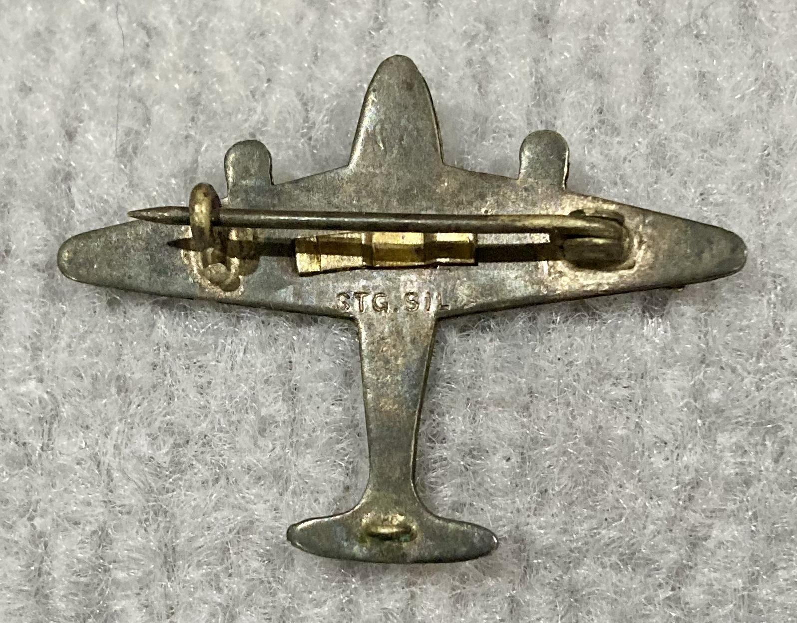 Reverse of Royal Australian Air Force gold tone and enamel sweetheart brooch attached to sterling silver plane