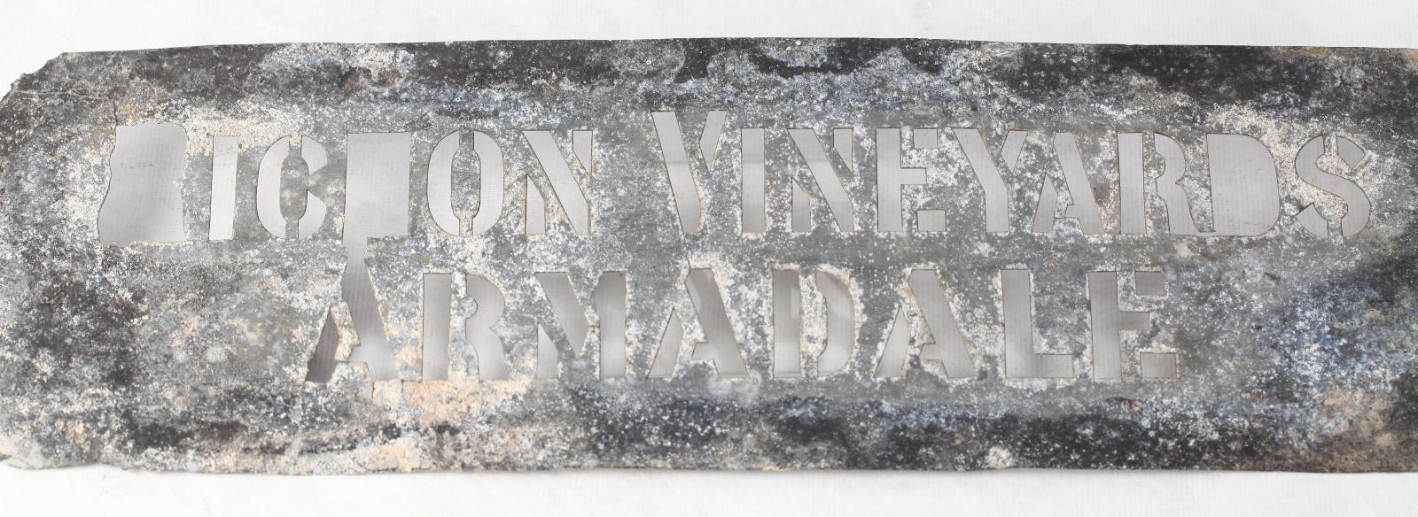 Metal stencil with words Richon Vineyard Armadale cut out