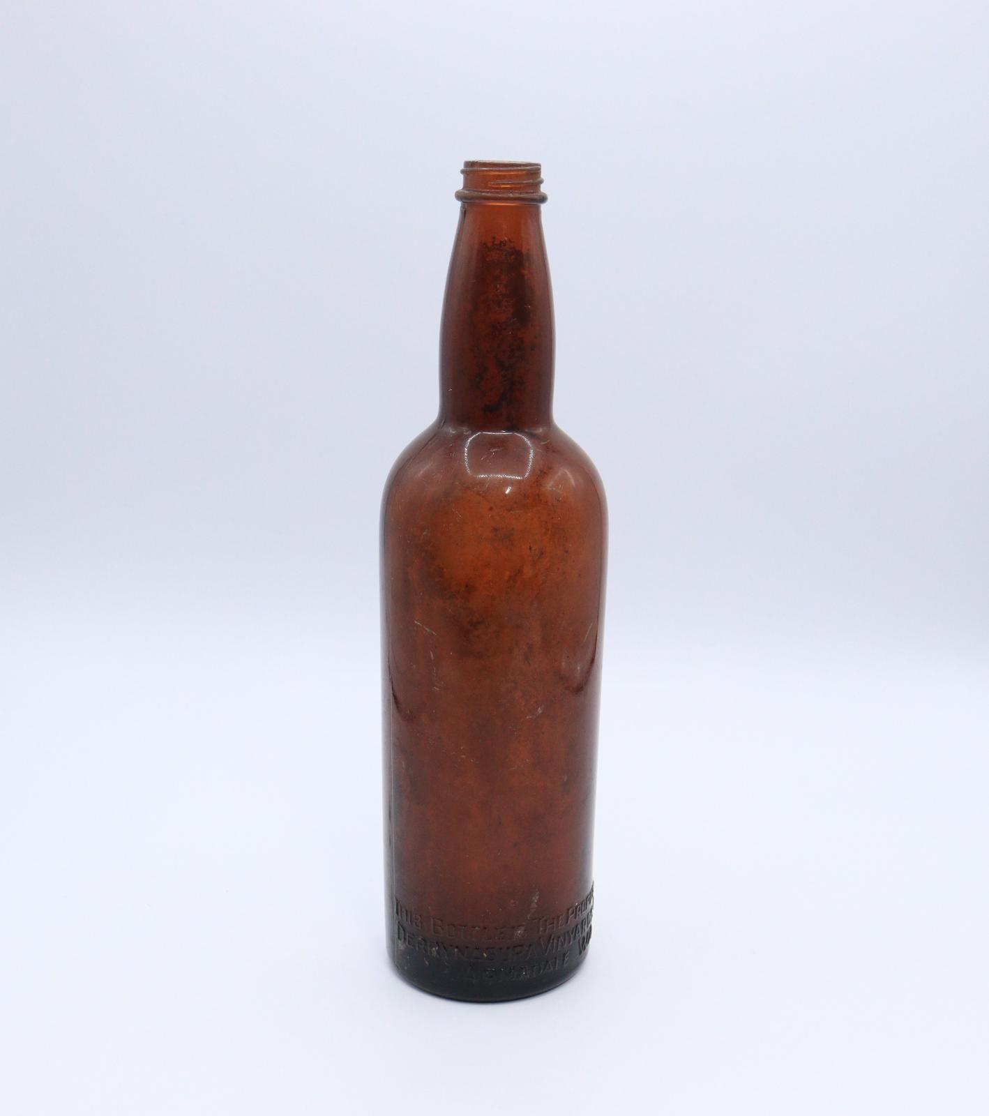 Cylindrical brown glass wine bottle