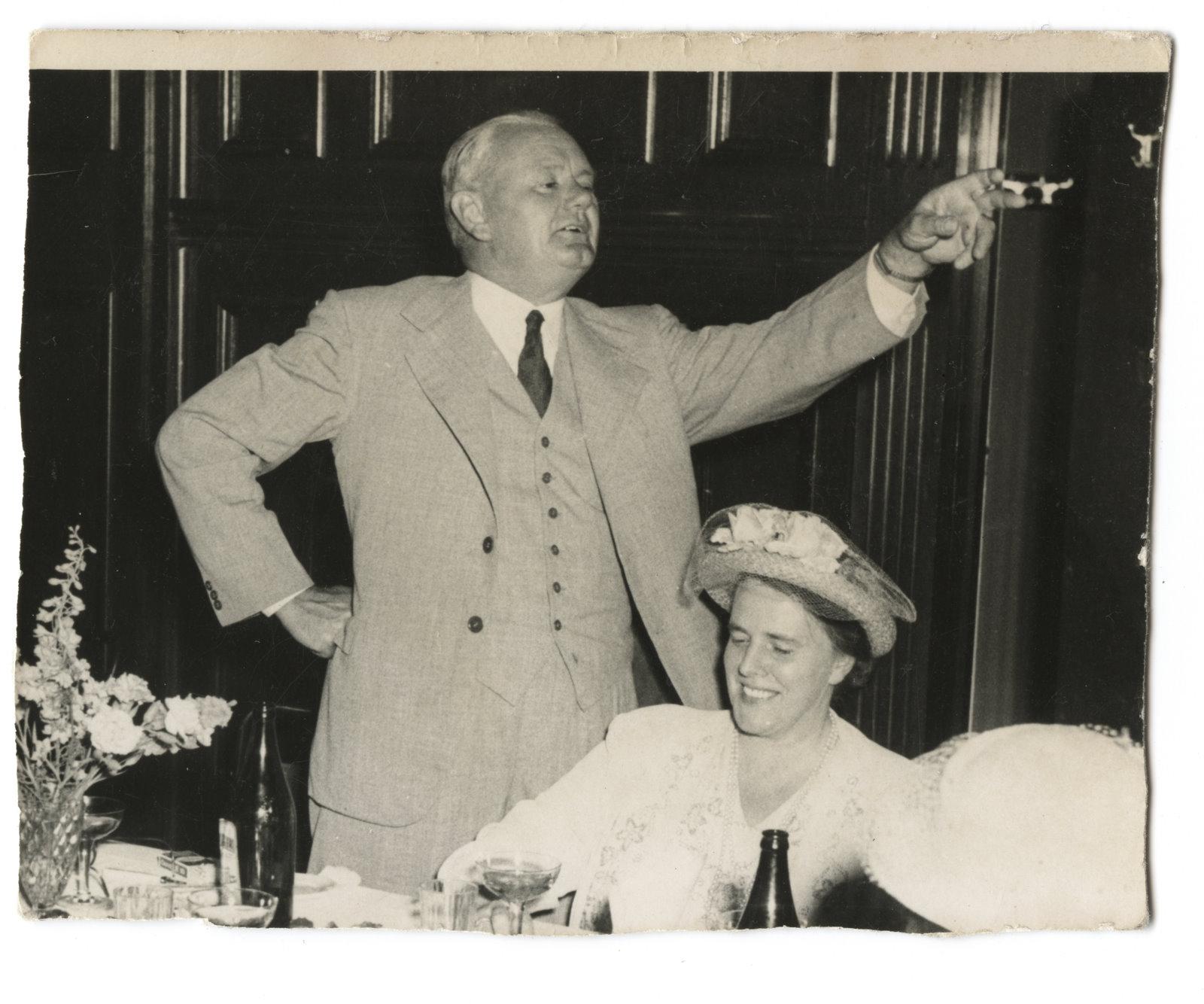 Dr. Carl Streich delivers a toast at an event.