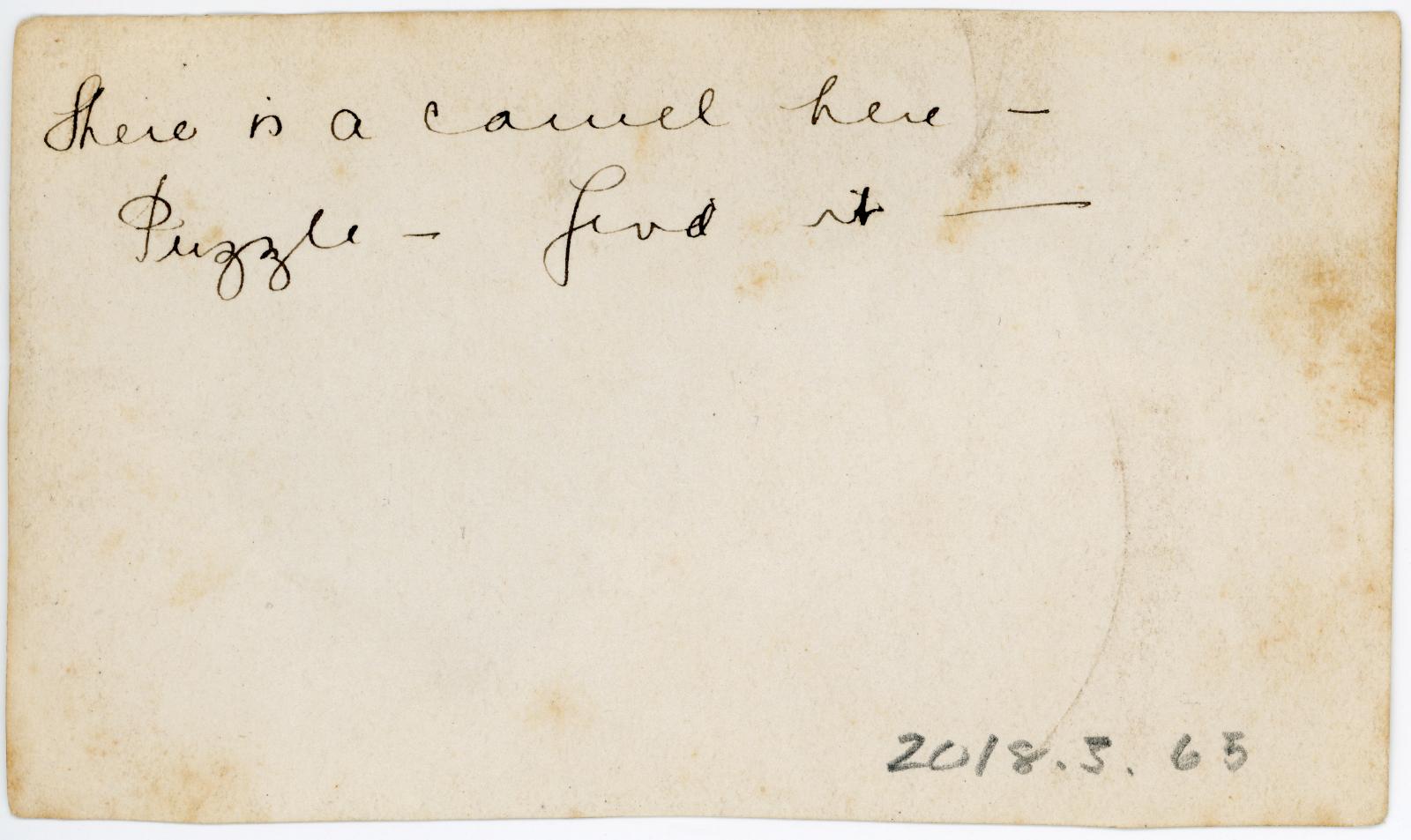 Rear view showing inscription.