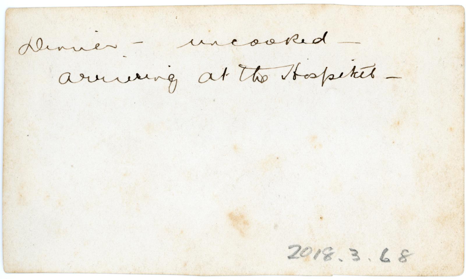 Rear view showing inscription.