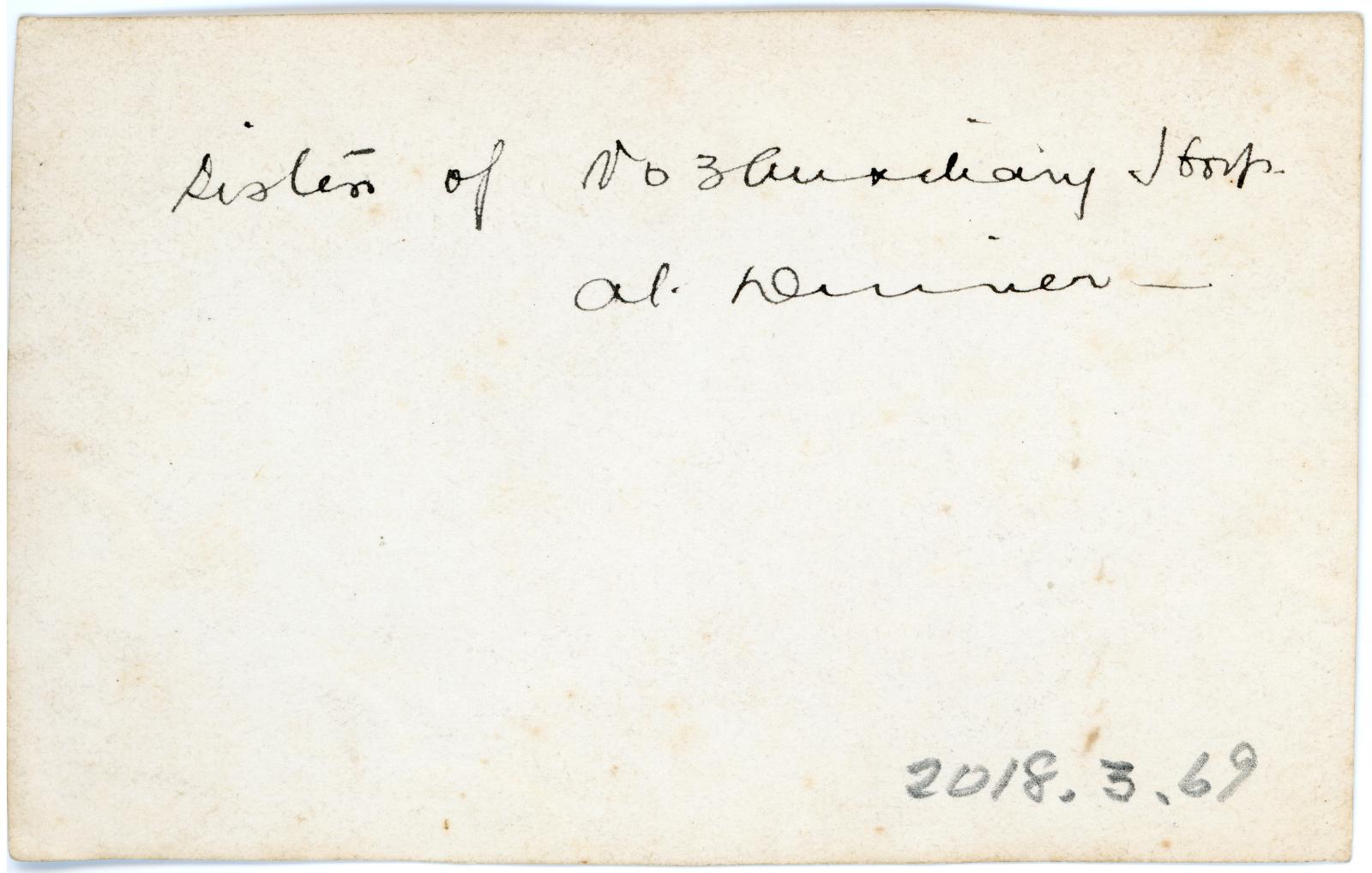 Rear view showing inscription.