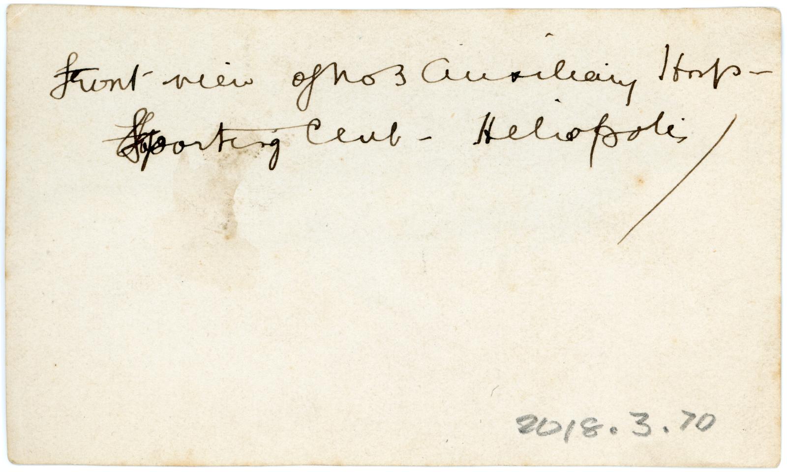 Rear view showing inscription.