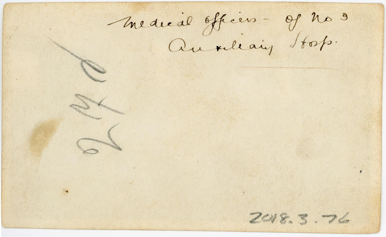 Rear view showing inscription.
