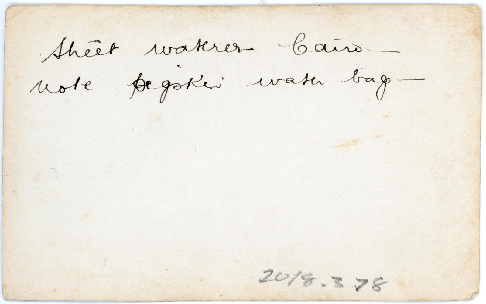 Rear view showing inscription.