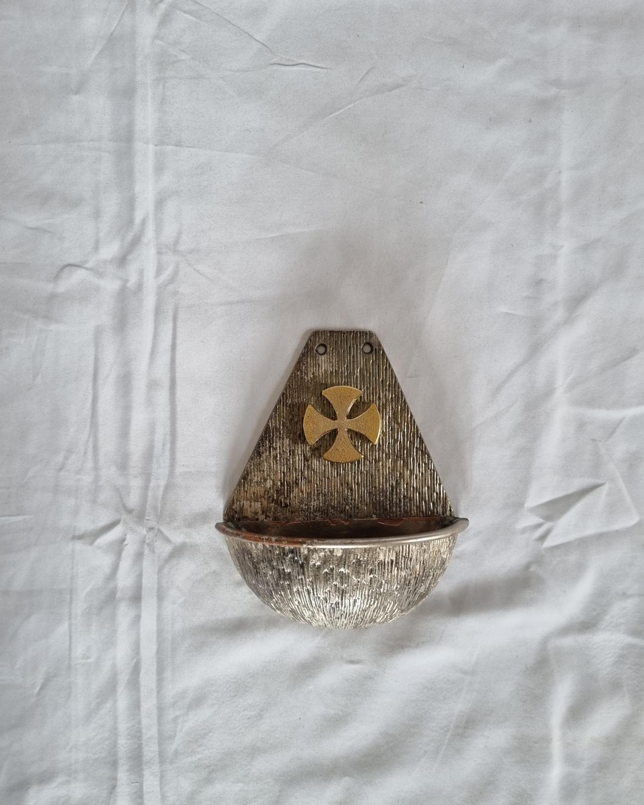 26-376 Metal (potentially copper) stoup photo with background. 