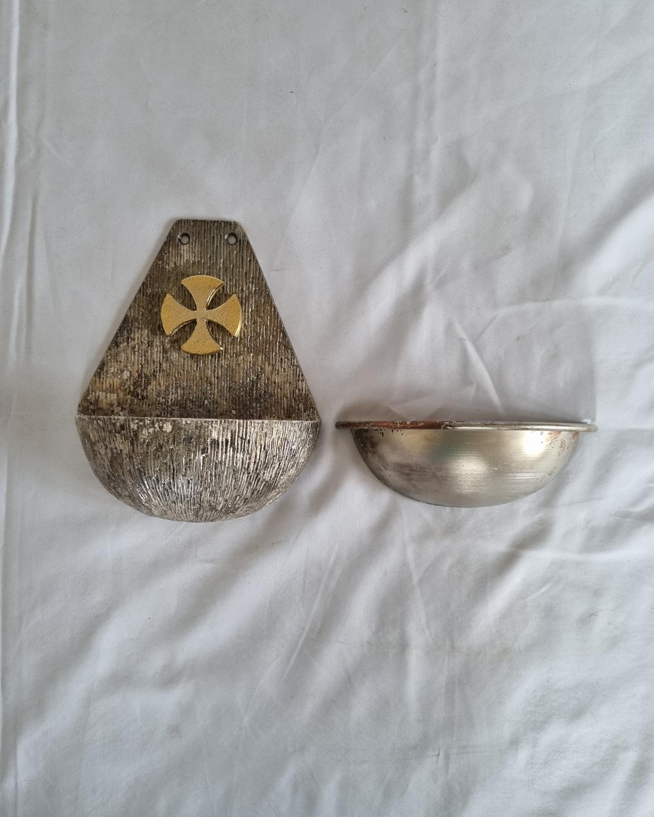 26-376 Metal (potentially copper) stoup photo with background with basin placed on the side of the stoup front-view.