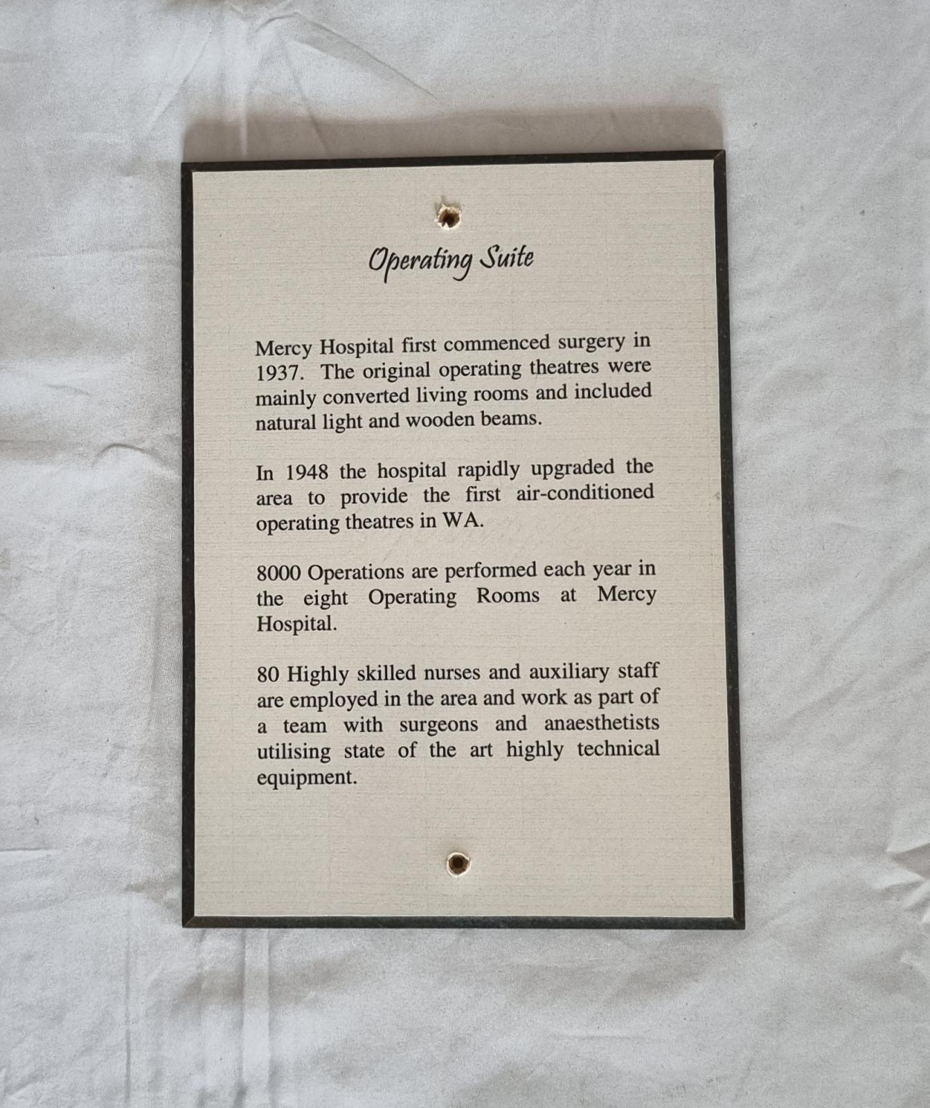 26-378.2 Woodblock-print of description of the Operating Suite photo with background front-view.