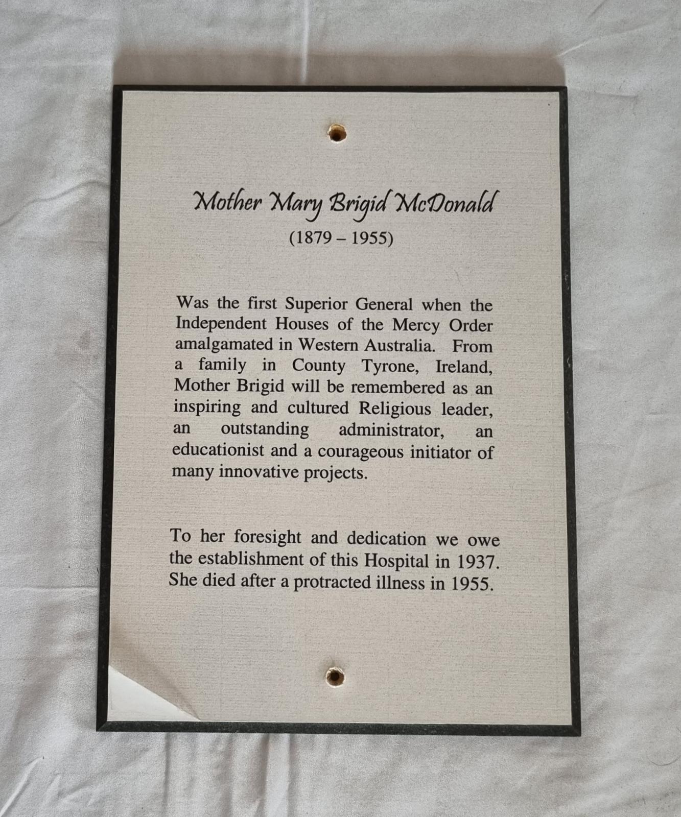 26-380.2 Woodblock-print of description of Mother Brigid McDonald RSM photo with background front-view.