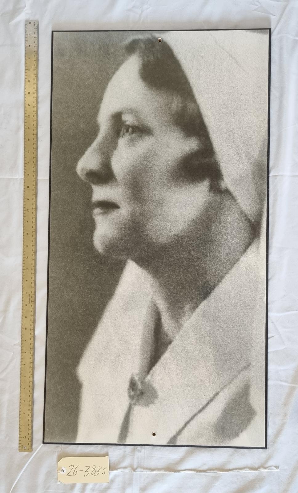 26-383.1 Large Black and White portrait of Irene O' Meara (nee Digney) photo with scale and tag.