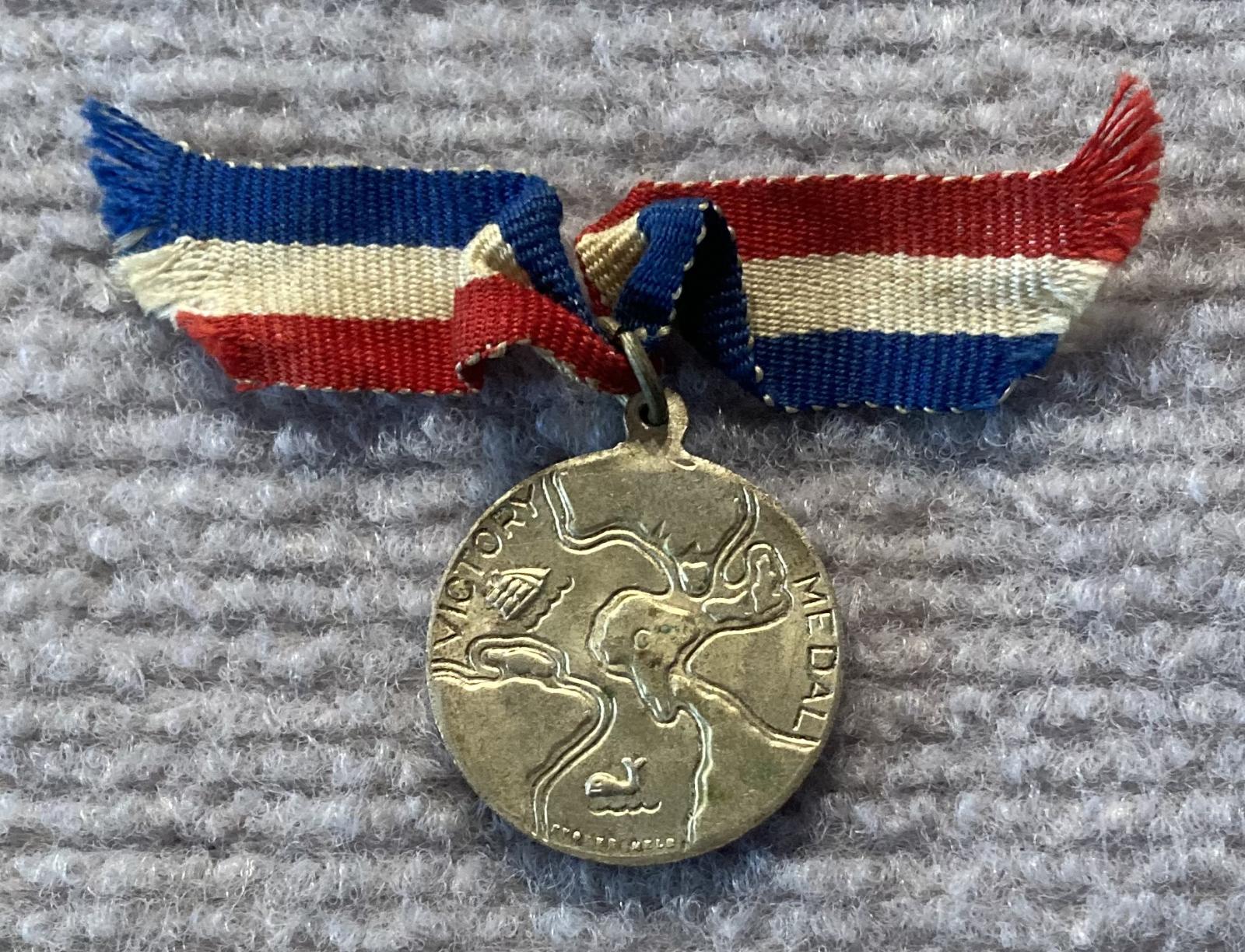 Reverse of 1945 Commemorative Victory Medal - silver with ribbon