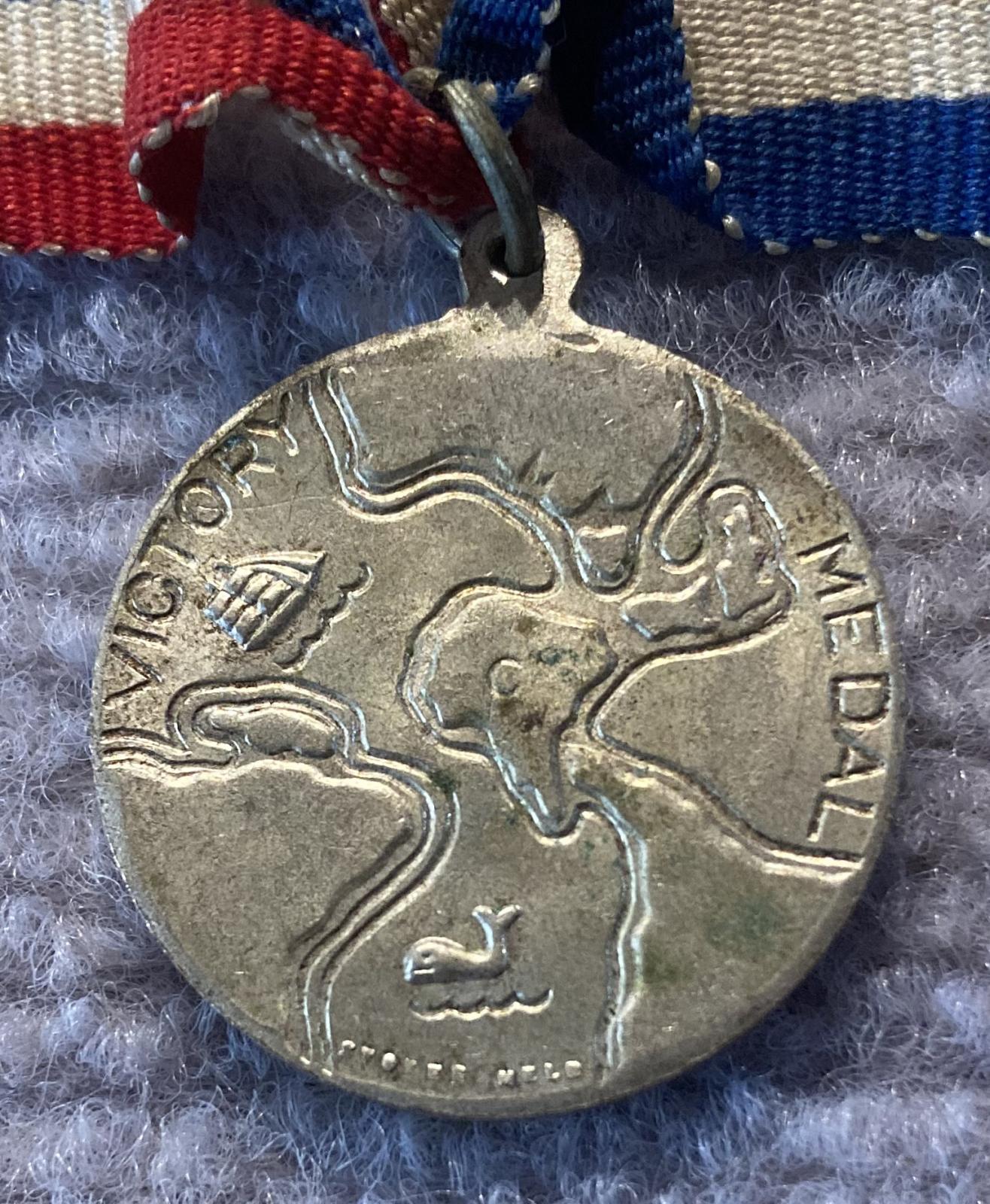 Close up of reverse of 1945 Commemorative Victory Medal - silver 