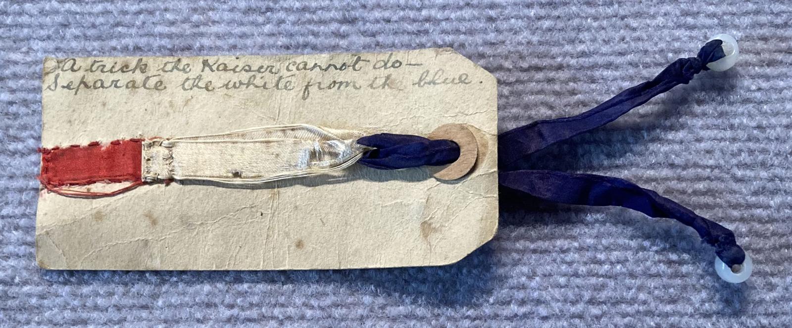 WWI era patriotic tag with ribbon and verse
