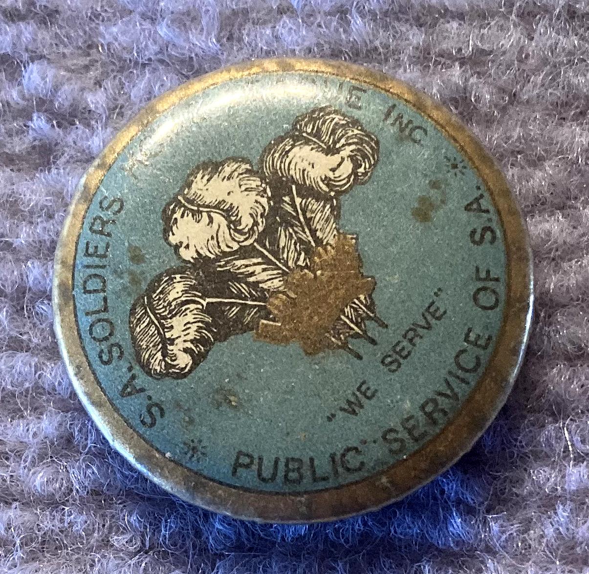 Angled view of S.A. Soldiers' Home League Inc. Public Service of S.A. fundraising badge