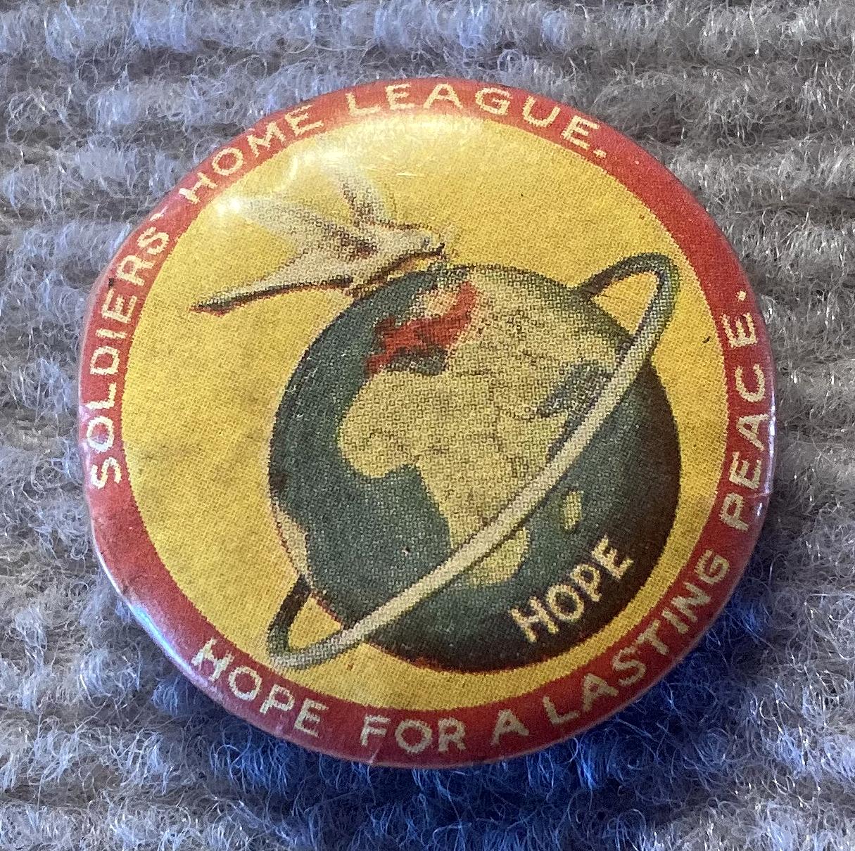 Angled view of Soldiers' Home League fundraising badge/button - Hope