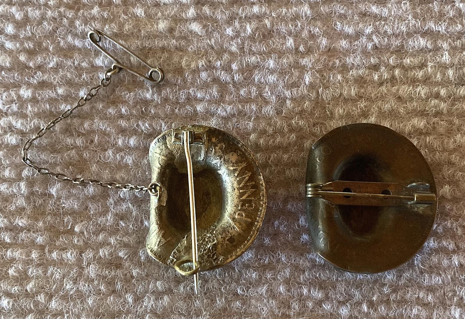 Reverse of both Australian penny slouch hat sweetheart brooches