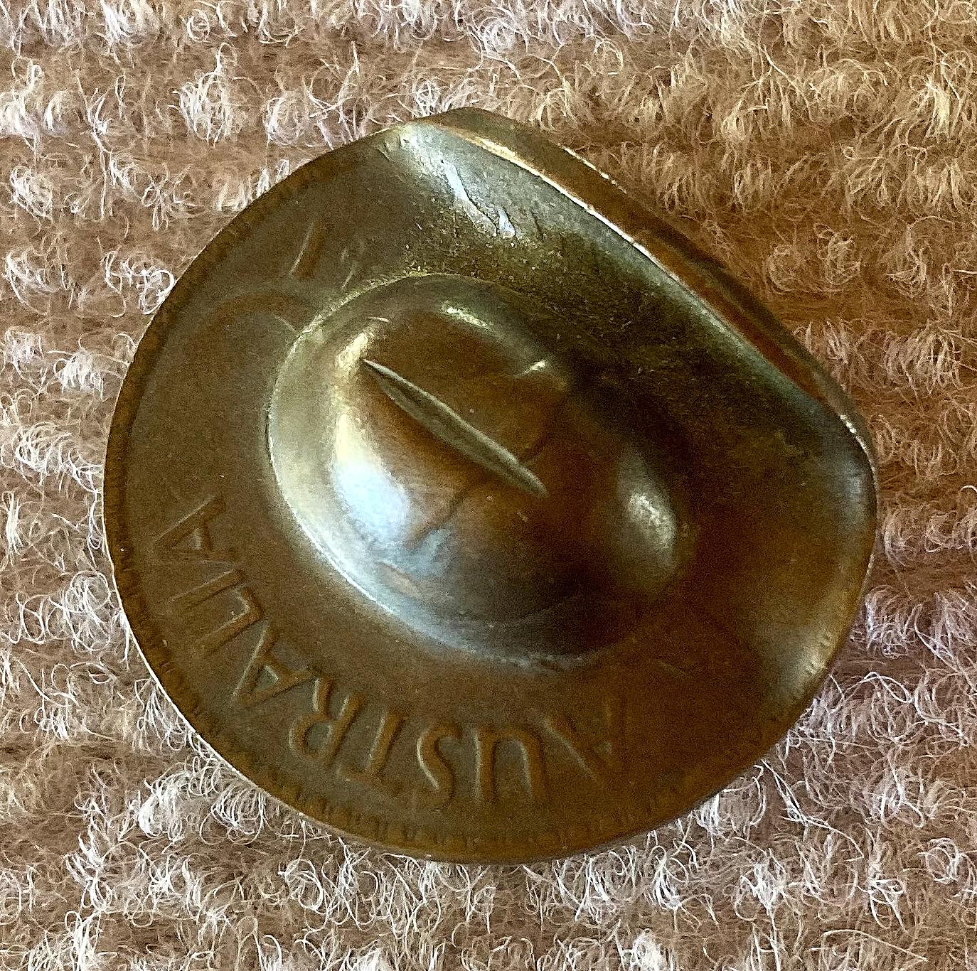 Angled view of 1941 Australian Penny slouch hat sweetheart brooch