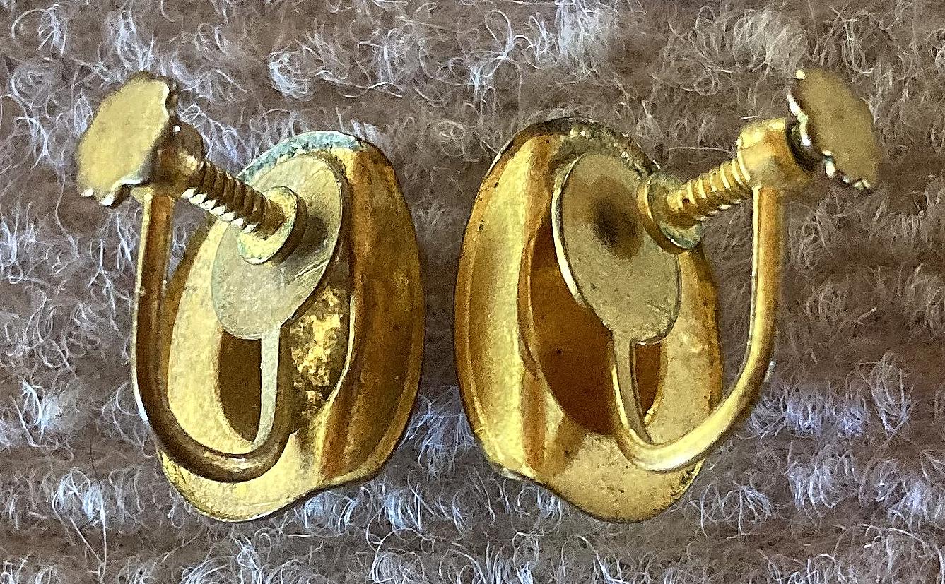 Bottom view of gold tone slouch hat screw back earrings