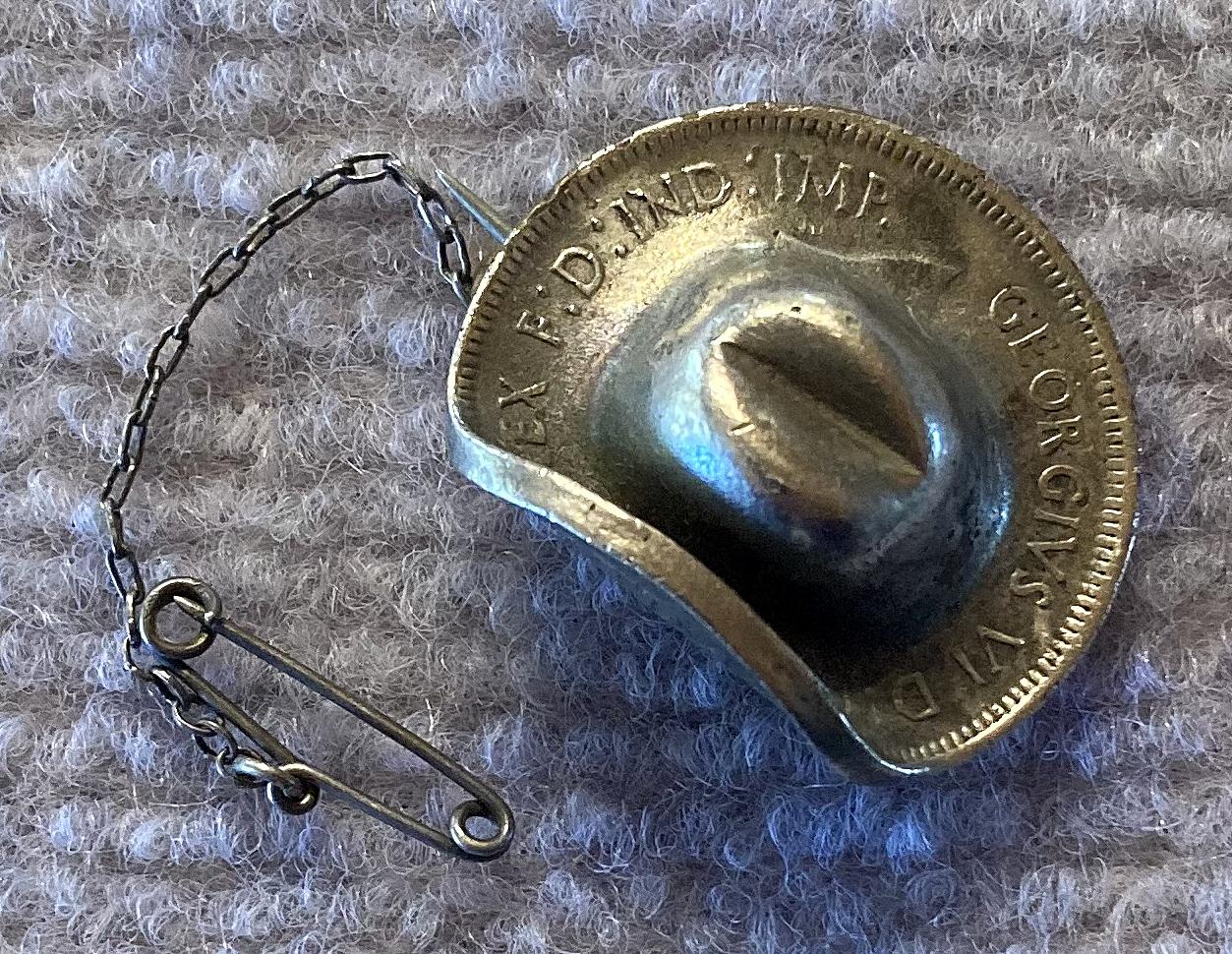 Other angled view of silvered 1943 Australian Penny slouch hat sweetheart brooch 