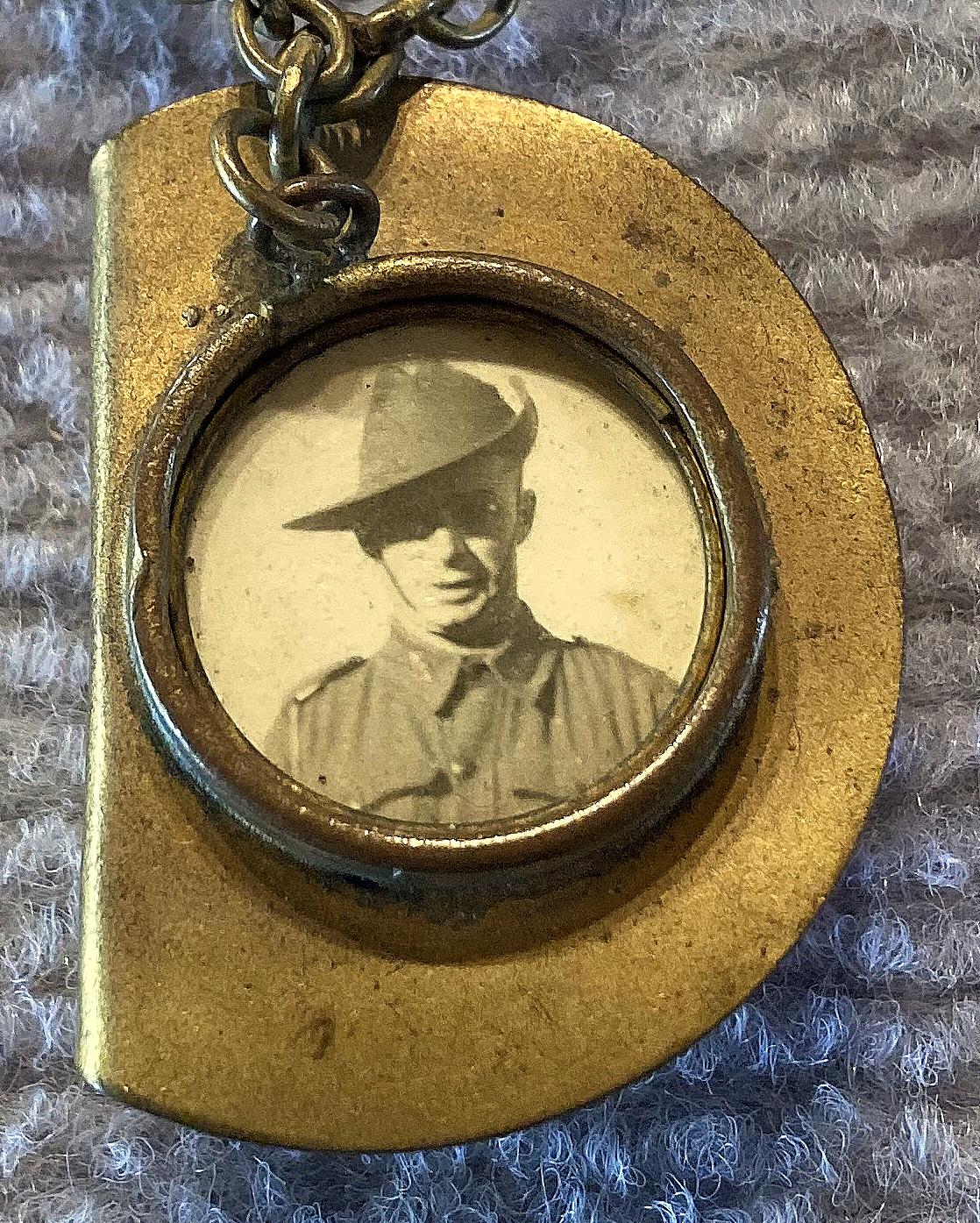 Close up of slouch hat sweetheart brooch containing soldier portrait - 2