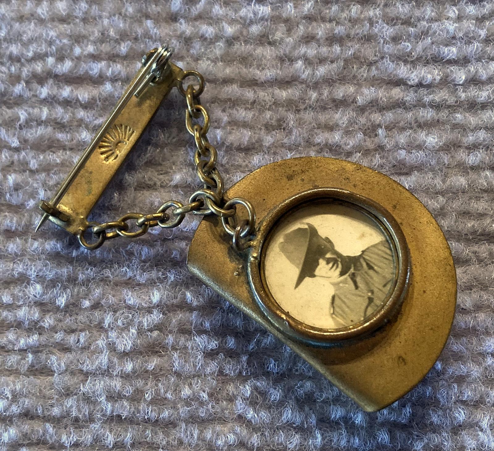 Angled view of slouch hat sweetheart brooch containing soldier portrait - 2