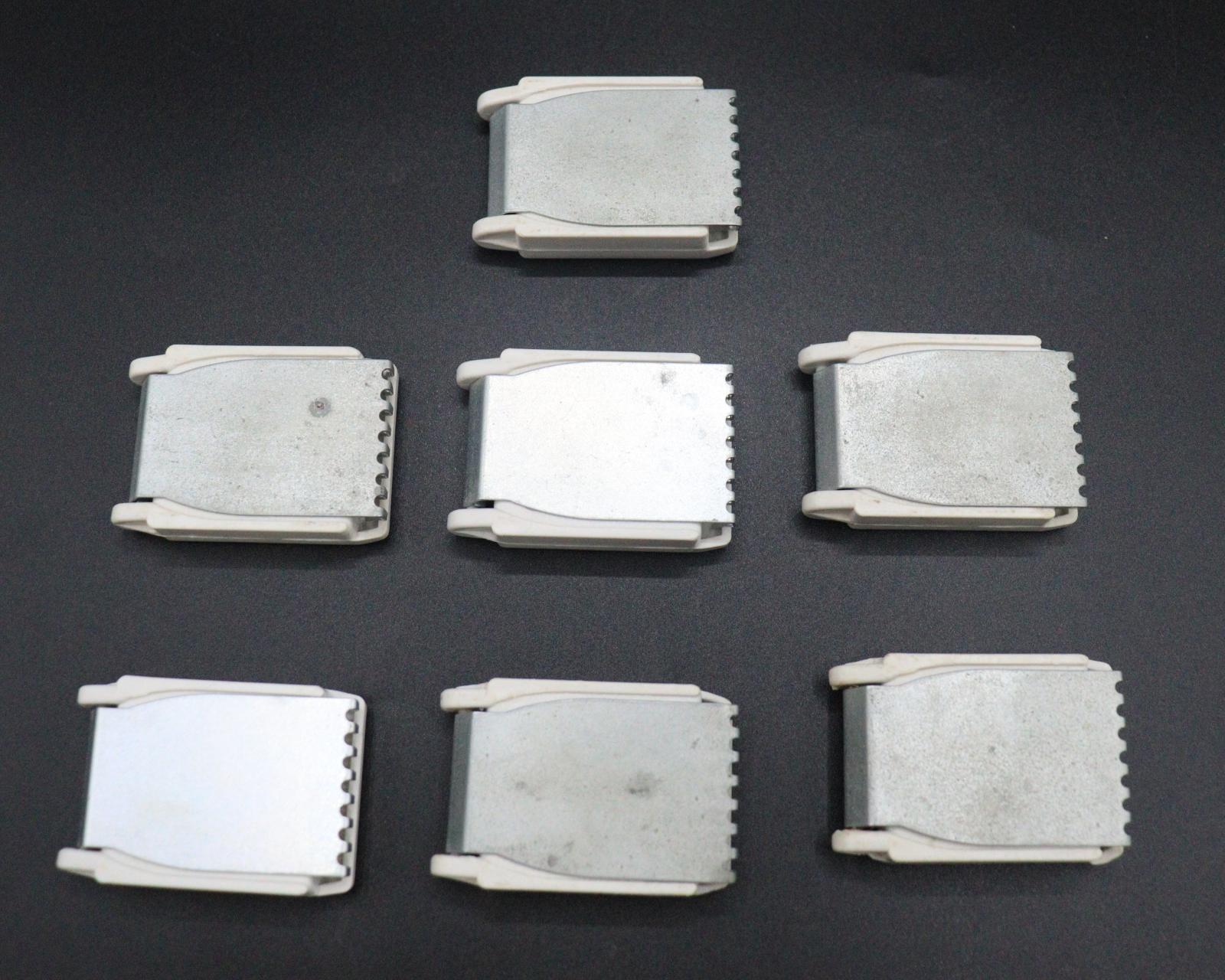 7 rectangular metal and plastic cartridges for the BROTHER knitting machine.