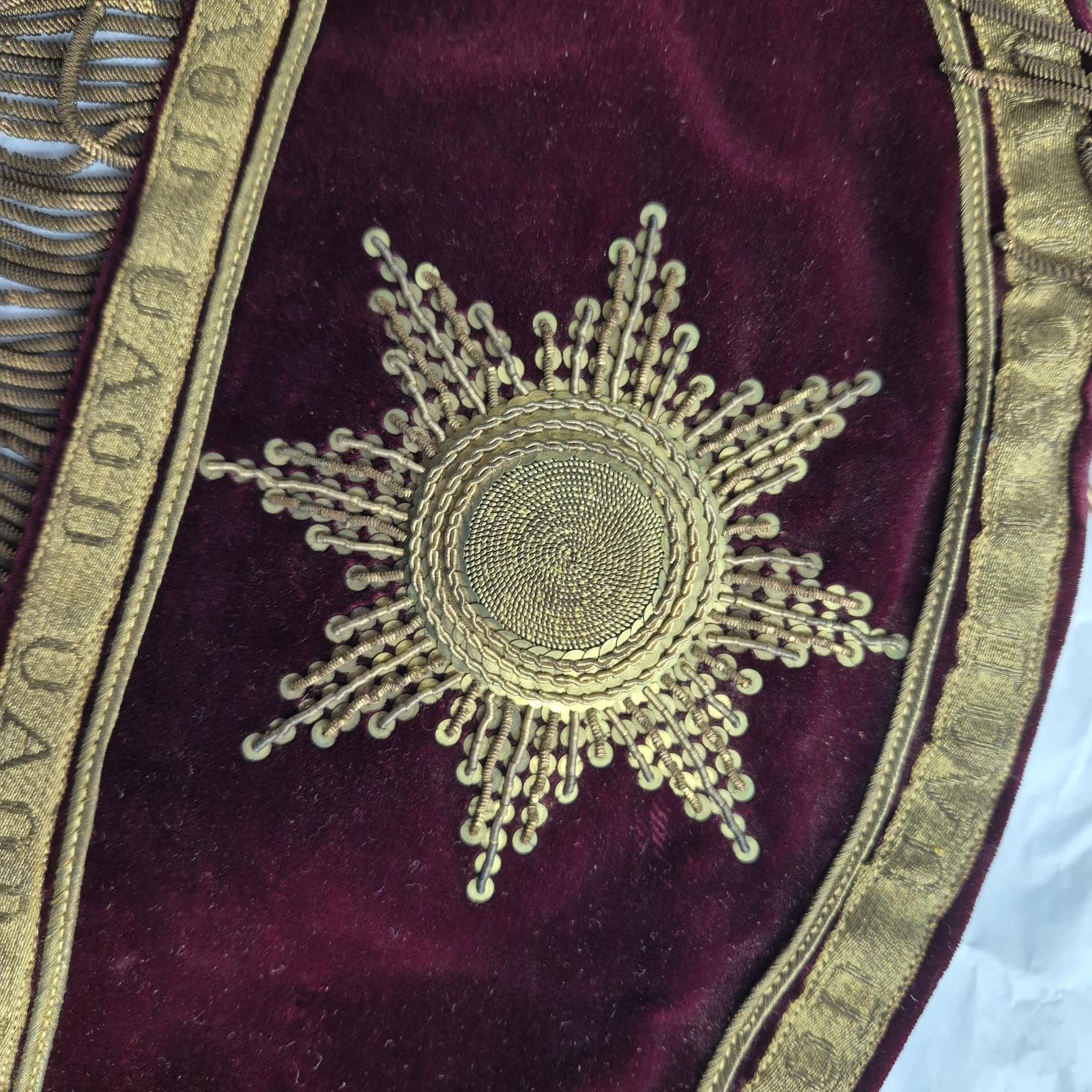 maniple, starburst embroidery