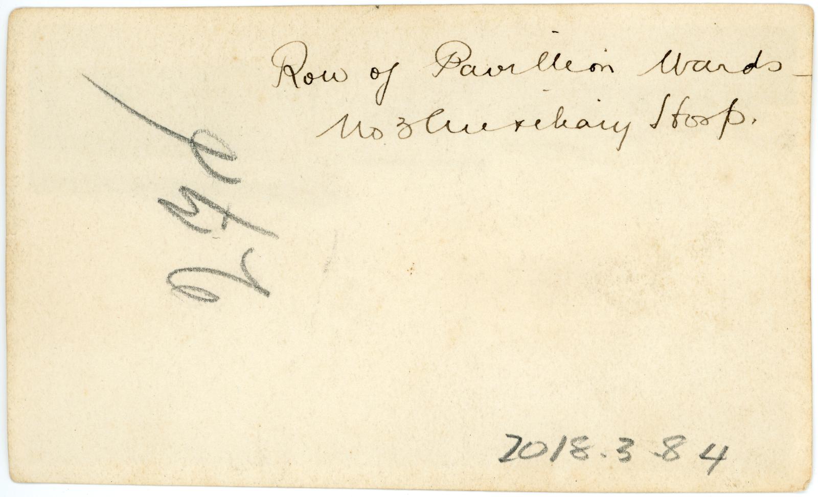 Rear view showing inscription.
