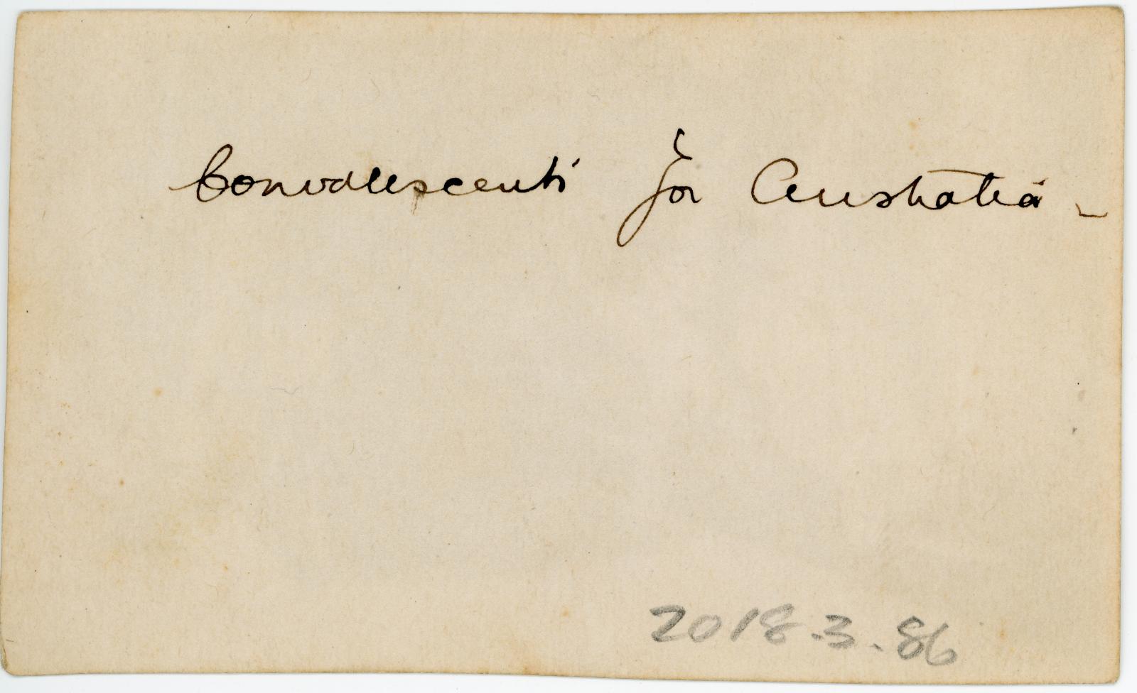 Rear view showing inscription.