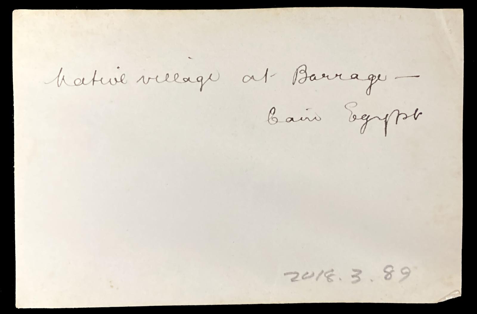 Rear view showing inscription.