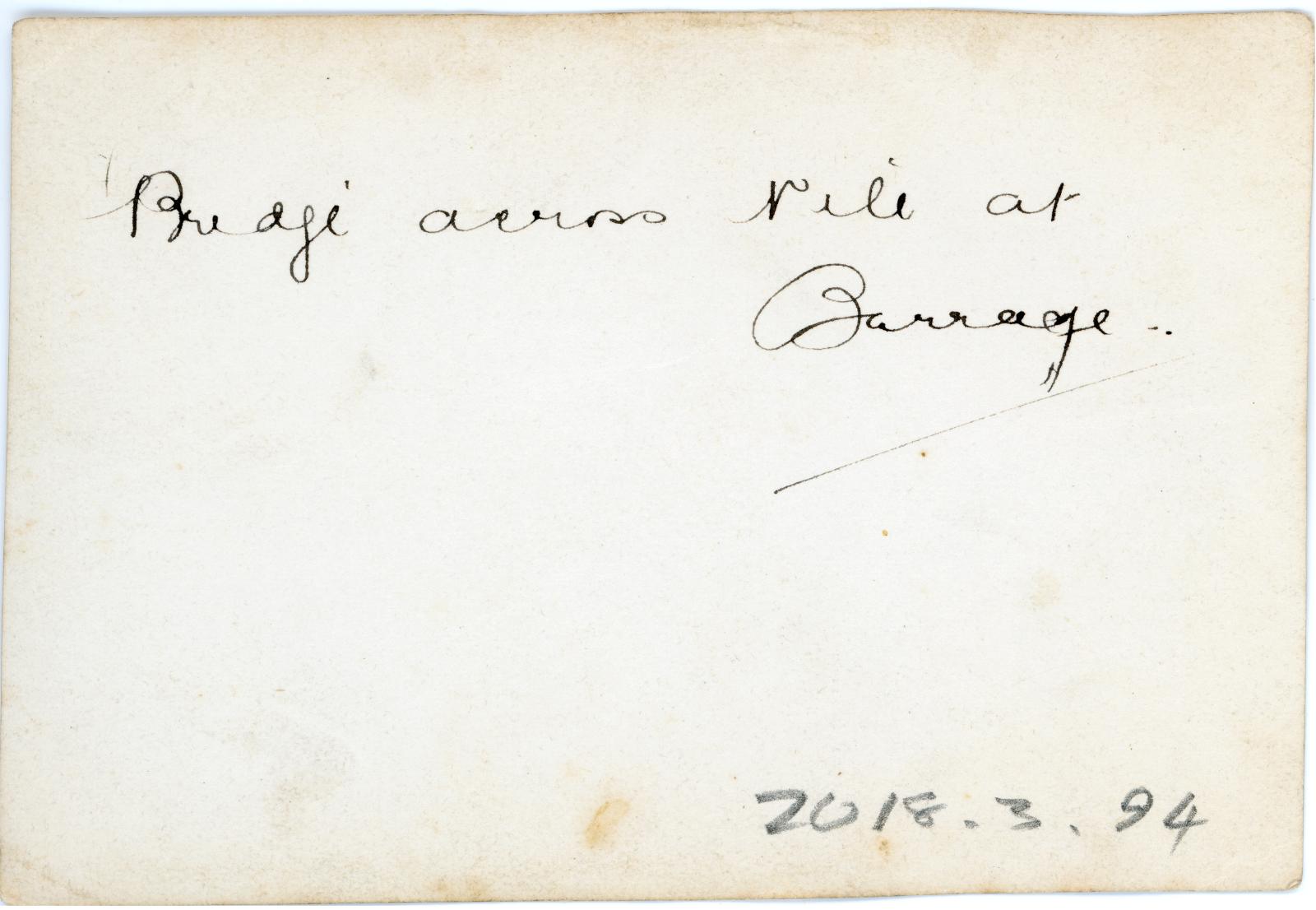 Rear view showing inscription.