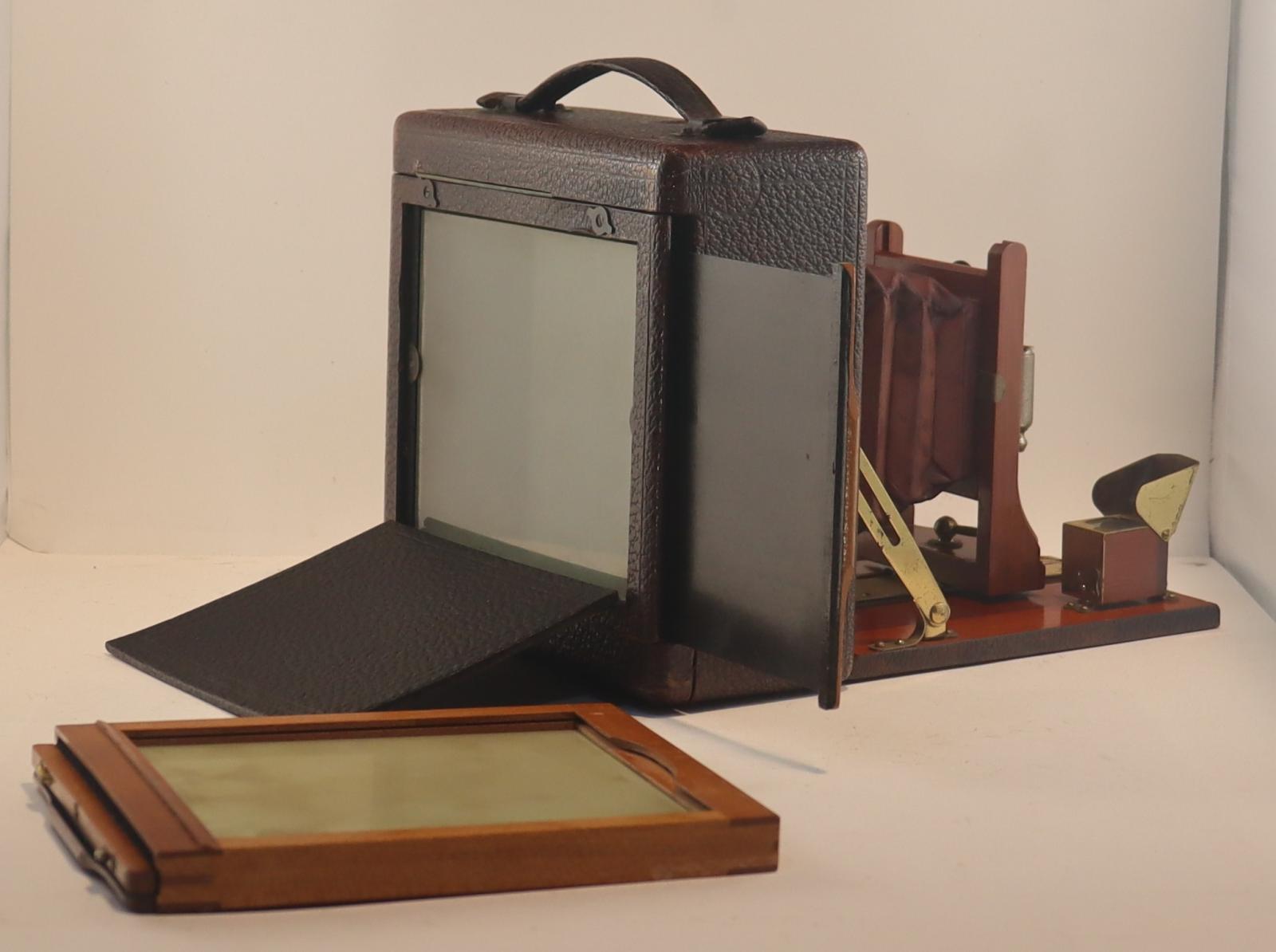Photographic plate and back view of opened Century Company Camera