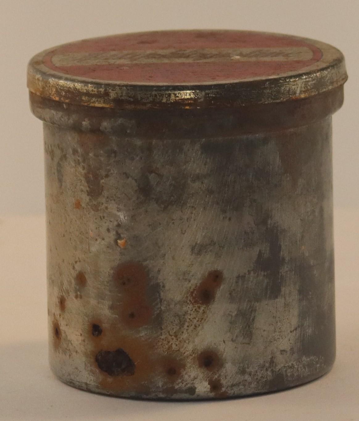 Side view of Antiphlogistine Tin