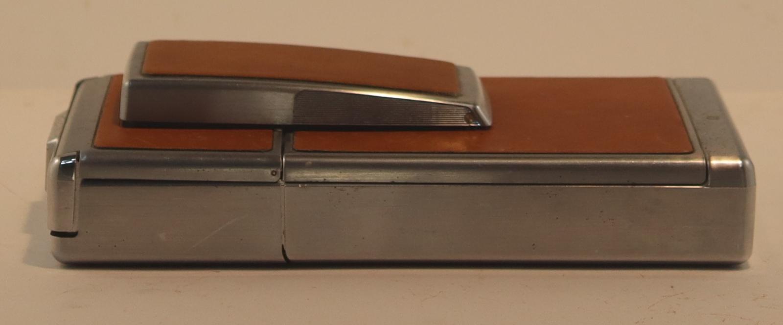 Side view of closed Polaroid SX-70 Land Camera