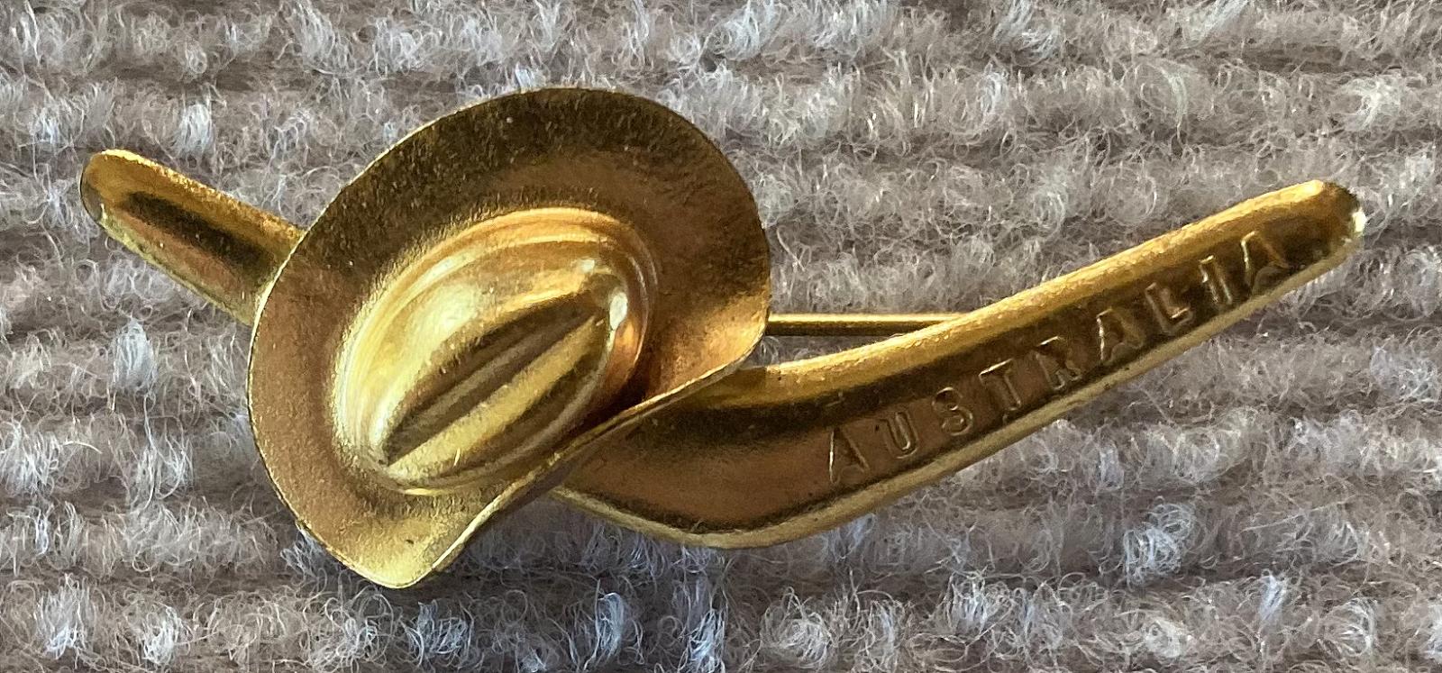 Gold tone patriotic brooch with slouch hat and boomerang