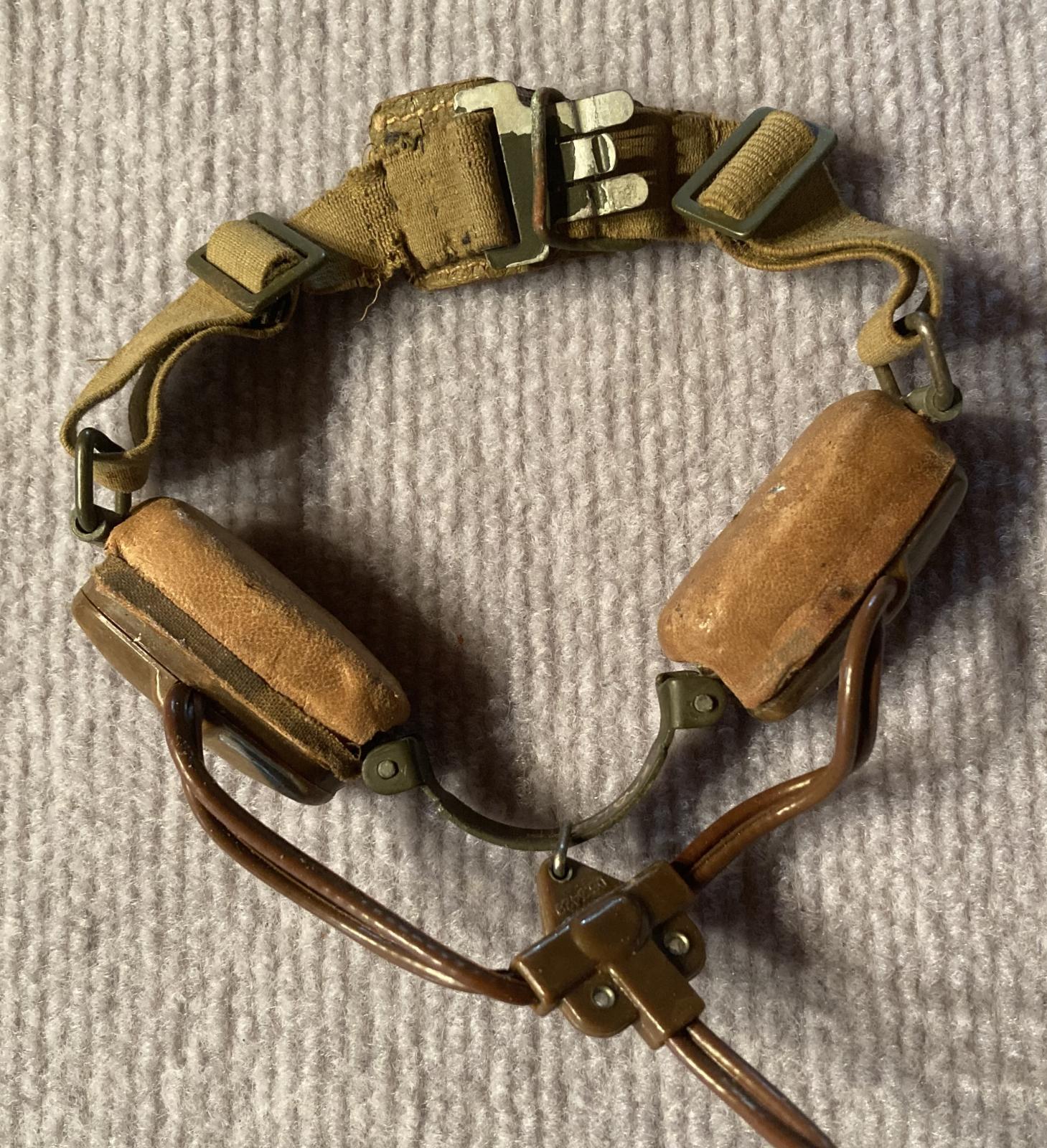 Close up of WWII era Air Force low level throat microphone