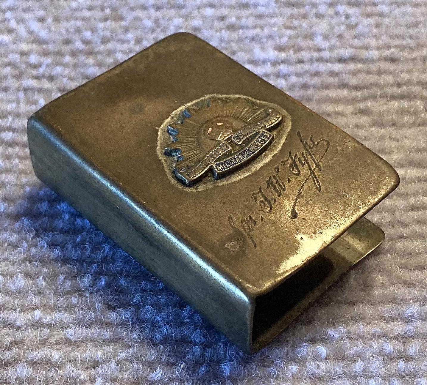 Angled view of WWII metal matchbox cover -  Sapper Thomas Walter Fyfe