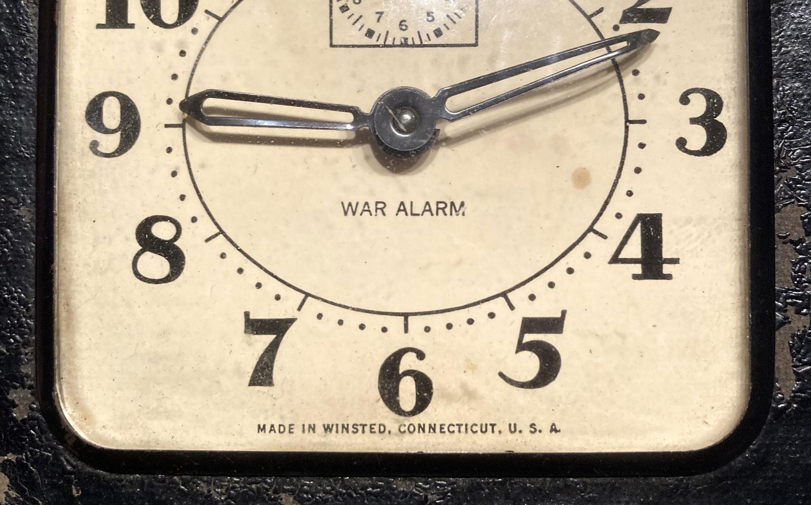 Close up of lower section of face of War Alarm clock 