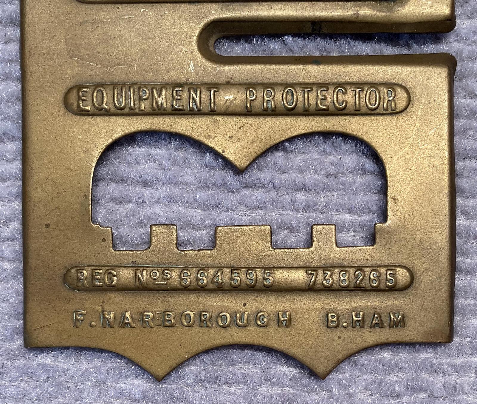 Close up of lower section of WWI era 'New Pioneer Equipment Protector' brass button stick