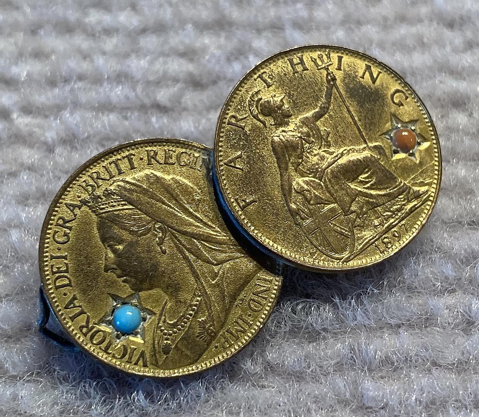 Angled view of sweetheart brooch made from gilded and decorated 1897 farthings