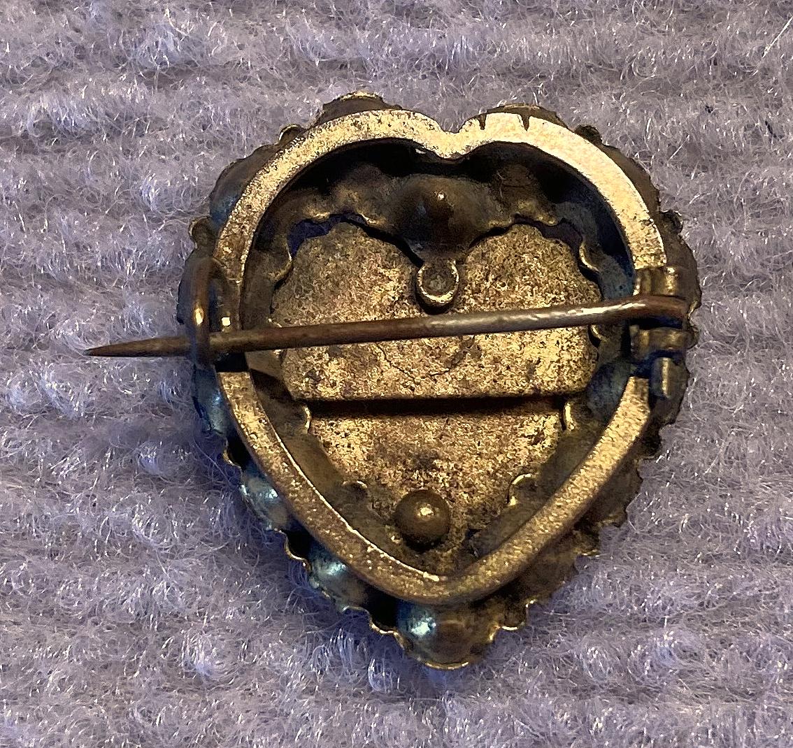 Reverse of antique heart shaped Mizpah sweetheart brooch 