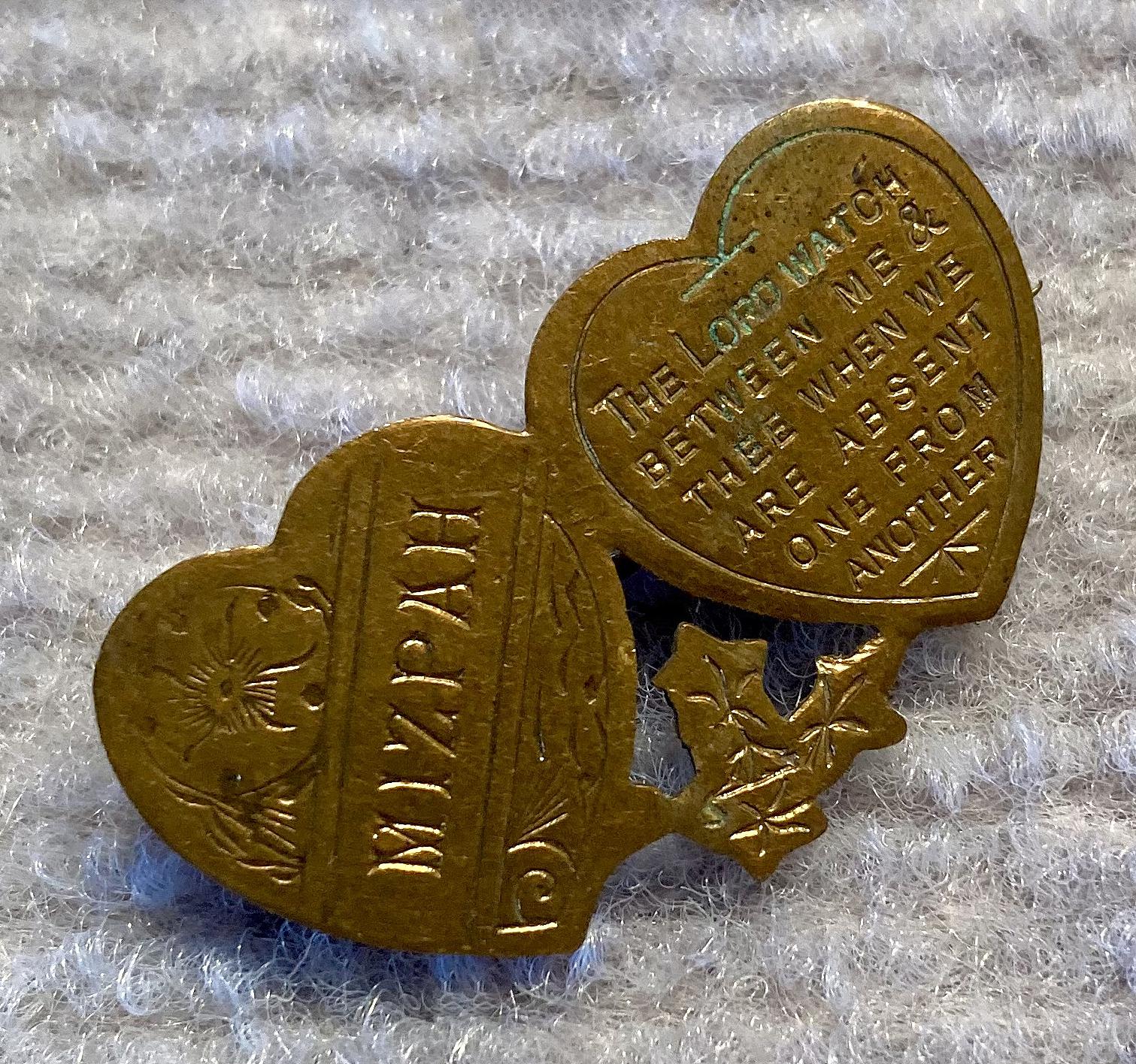 Angled view of Mizpah sweetheart brooch