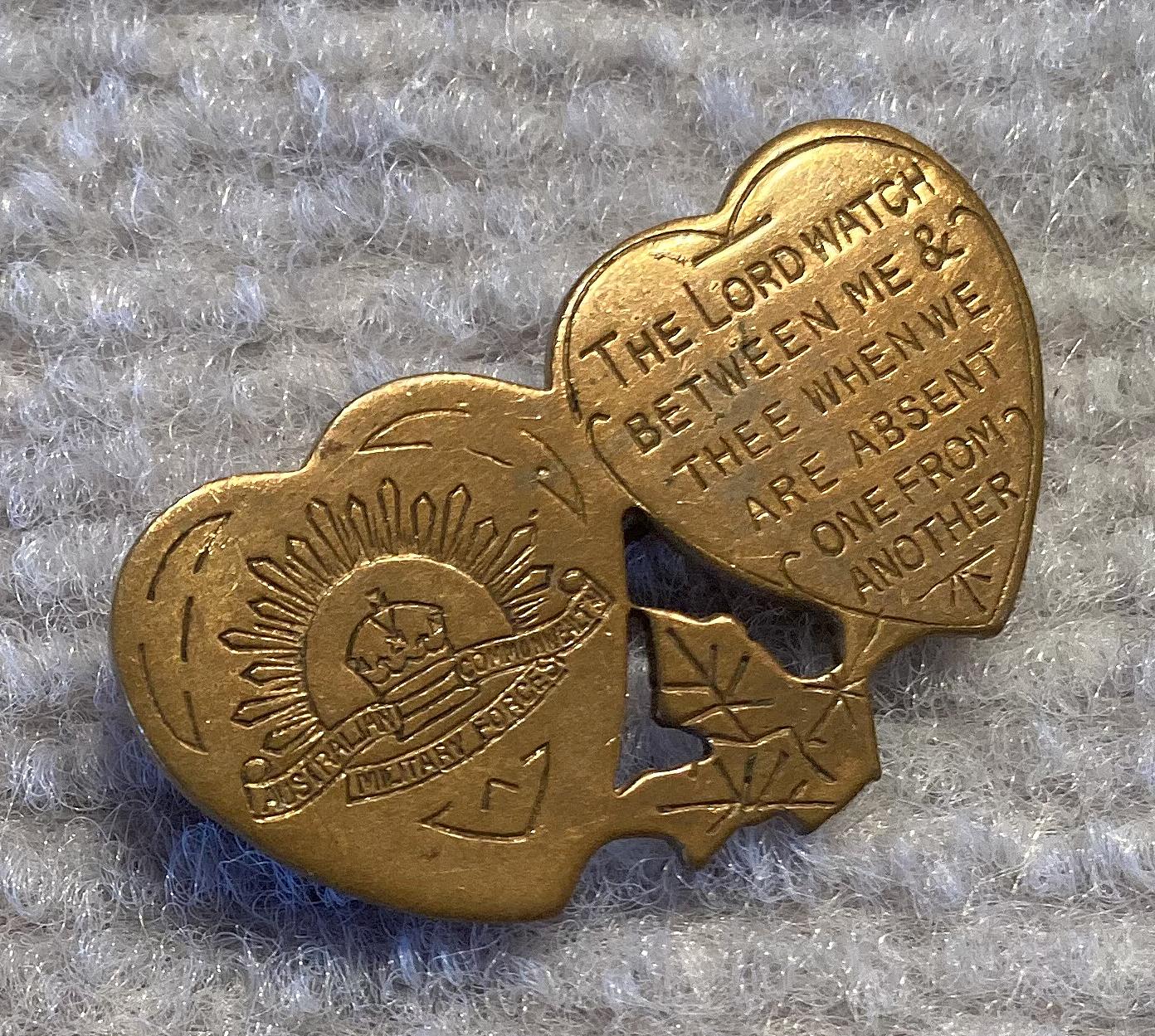 Angled view of Mizpah brooch with rising sun motif