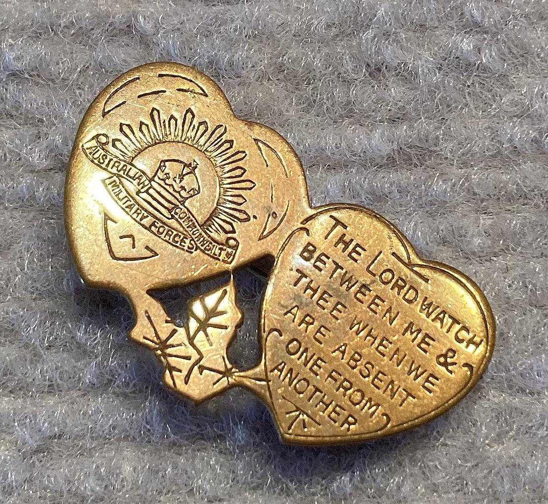 Other angled view of Mizpah brooch with rising sun motif