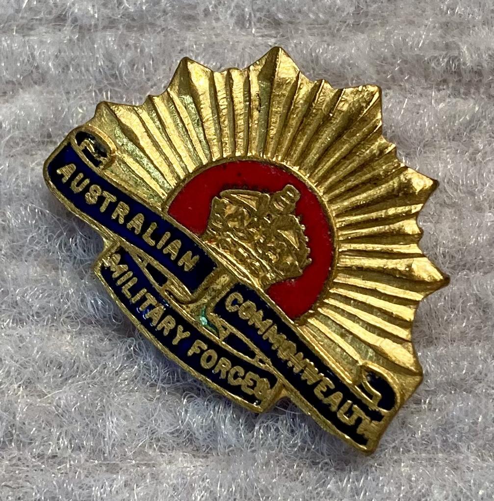 Other angled view of miniature Rising Sun badge metal and enamel brooch