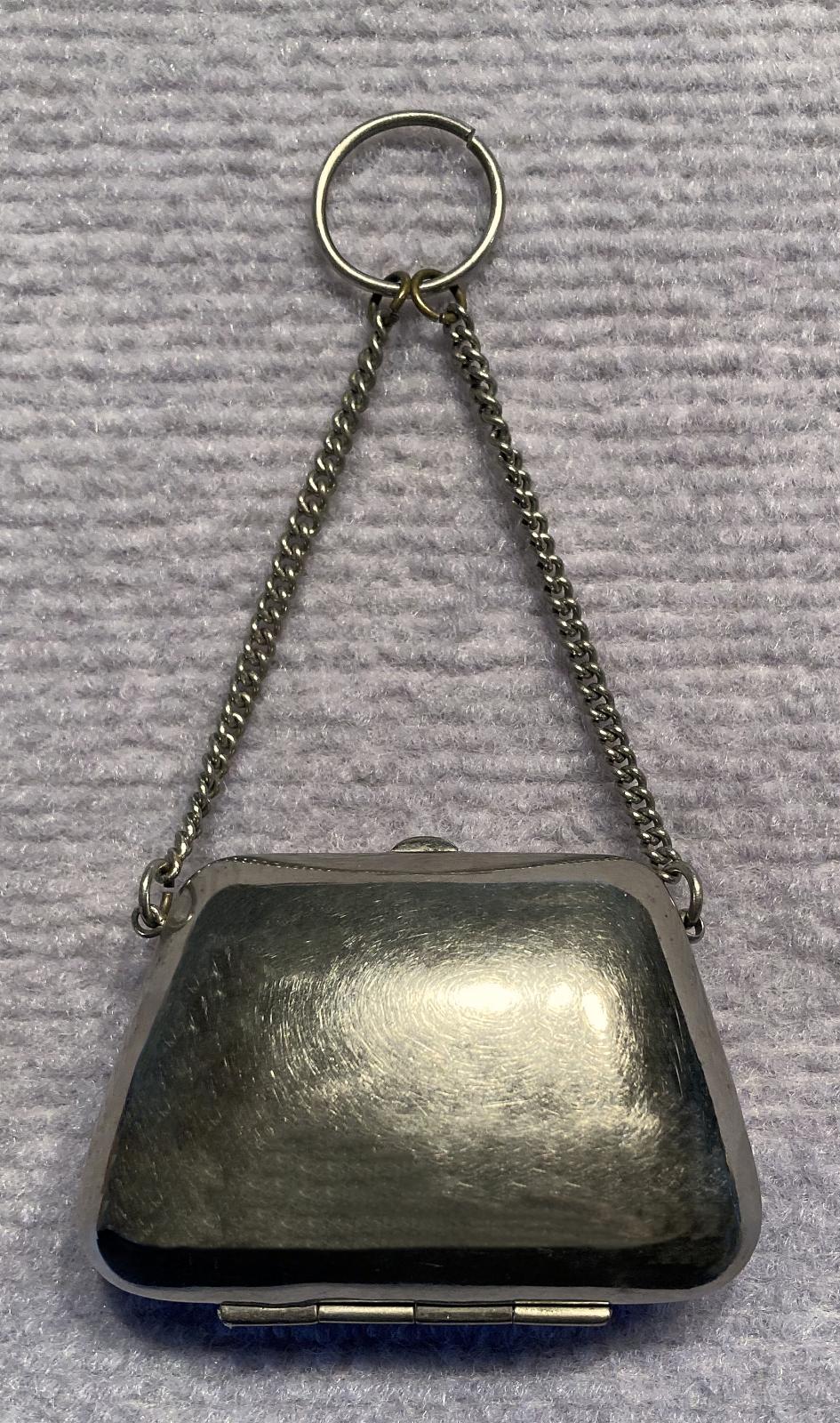 Reverse of souvenir metal ladies dance purse or chatelaine 