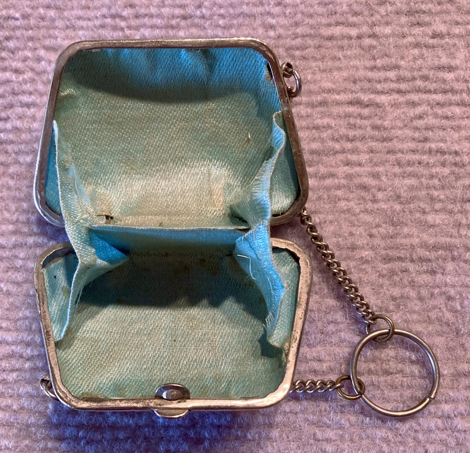 Top view of open souvenir metal ladies dance purse or chatelaine 