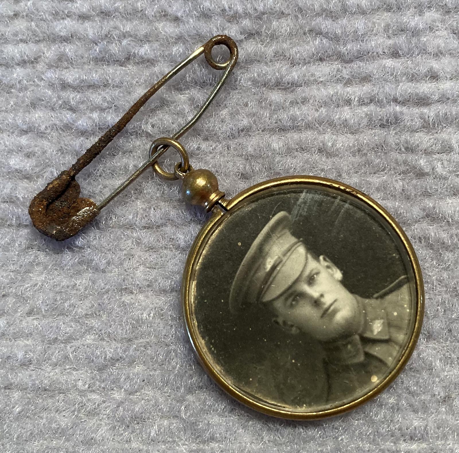 Angled view of WWI pendant locket featuring an Australian soldier